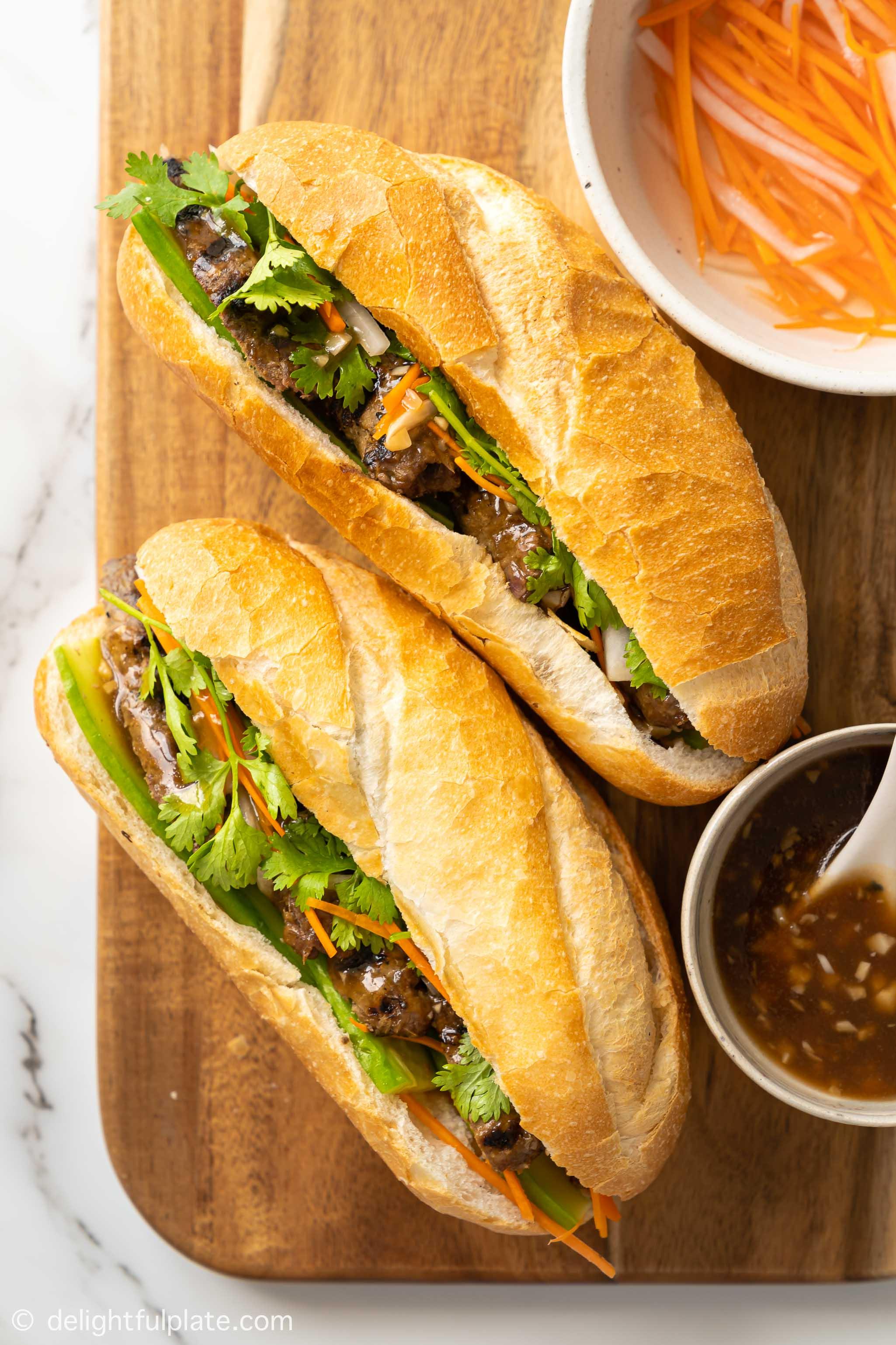 two loaves of Vietnamese lemongrass beef Banh mi